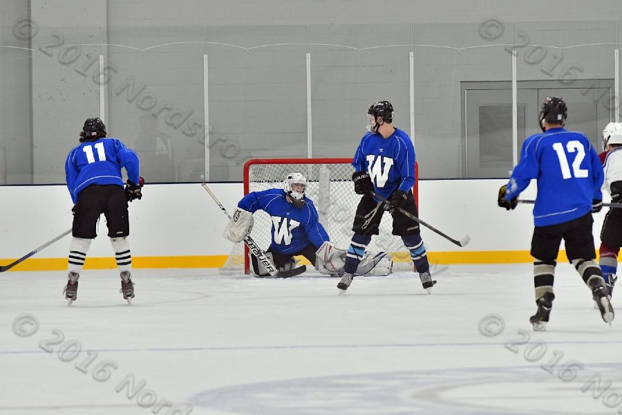Wheaton College Men\'s Ice Hockey vs Middlesex Community College. - Photo By: KEITH NORDSTROM
